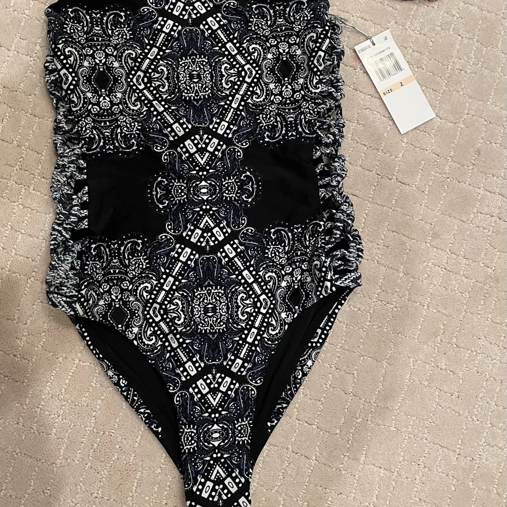 One piece swim suit size 2